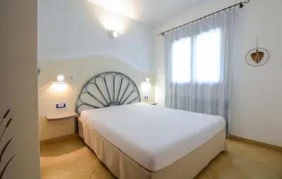 Letto o letti in una camera di 2 Bedroom Gorgeous Home In Costa Rei