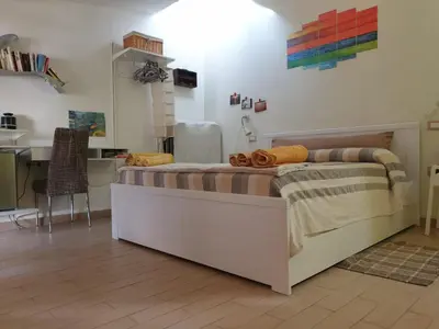 Letto o letti in una camera di B&B Annalu'