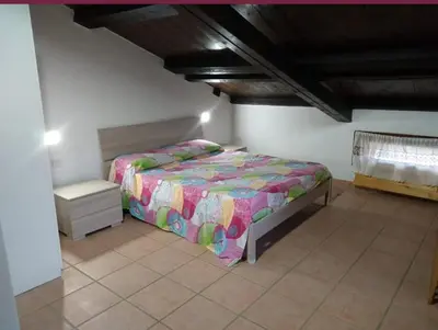 Letto o letti in una camera di Casa vacanza Is Argiolas