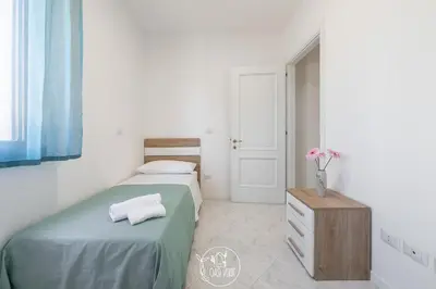 Letto o letti in una camera di L' Oasi Verde