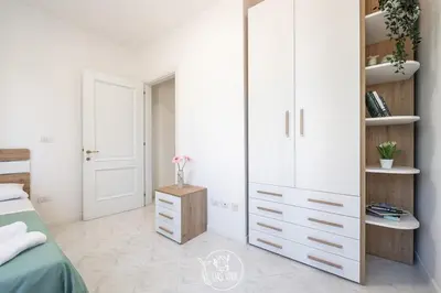 Letto o letti in una camera di L' Oasi Verde