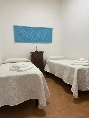 Letto o letti in una camera di Casa Vacanze Janas