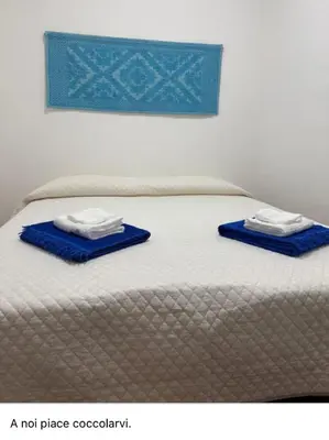 Letto o letti in una camera di Casa Vacanze Janas