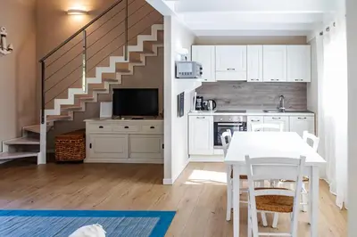 Cucina o angolo cottura di Appartamento in residence con piscina