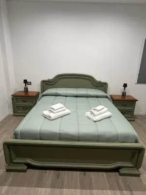 Letto o letti in una camera di DilettHouse vintage Apartment