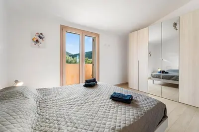 Letto o letti in una camera di Villa Rosa