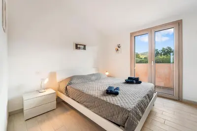 Letto o letti in una camera di Villa Rosa