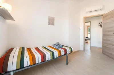Letto o letti in una camera di Villa Rosa
