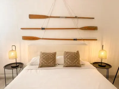 Letto o letti in una camera di X Porto Scalas