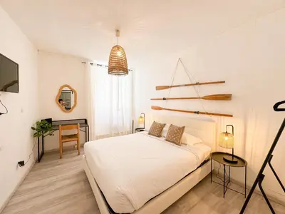 Letto o letti in una camera di X Porto Scalas