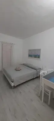 Letto o letti in una camera di Casa del Faro