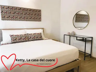 Letto o letti in una camera di Ketty, La casa del cuore