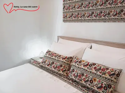 Letto o letti in una camera di Ketty, La casa del cuore
