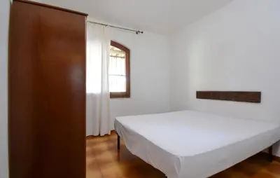 Letto o letti in una camera di 3 Bedroom Awesome Home In Costa Rei