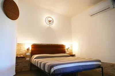 Letto o letti in una camera di Affittacamere Soleluna