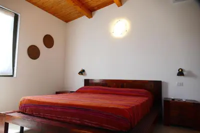 Letto o letti in una camera di Affittacamere Soleluna