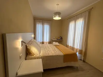 Letto o letti in una camera di Domu Jole B&B