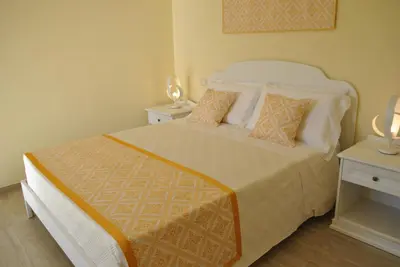 Letto o letti in una camera di Domu Jole B&B