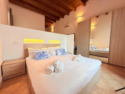Letto o letti in una camera di Casa Cavour