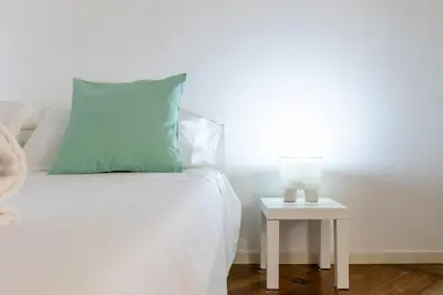 Letto o letti in una camera di Maison Saint Remy - Heart of Cagliari