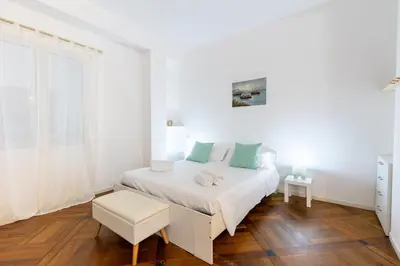 Letto o letti in una camera di Maison Saint Remy - Heart of Cagliari