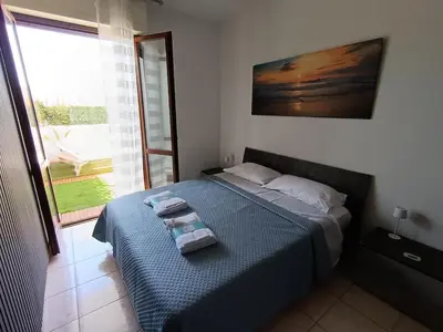 Letto o letti in una camera di Domussolar Where the journey is home