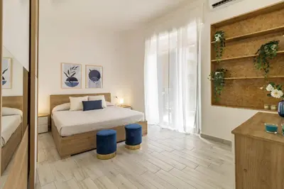 Letto o letti in una camera di Cagliari Center - In the Heart of San Benedetto