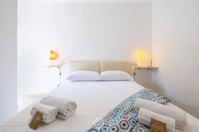 Letto o letti in una camera di Alessandra Garden Hideaway