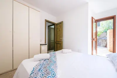 Letto o letti in una camera di Alessandra Garden Hideaway