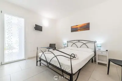Letto o letti in una camera di Modern 2BR Retreat in Pula - Bright & Quiet