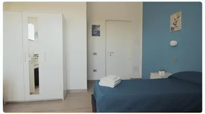 Letto o letti in una camera di Mhometredici Camera doppia Otello