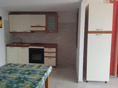 Cucina o angolo cottura di Case vacanze Baia Luna