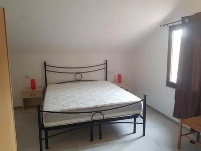 Letto o letti in una camera di Case vacanze Baia Luna