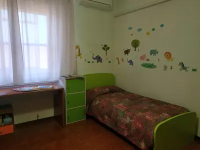 Letto o letti in una camera di Casa Angelina