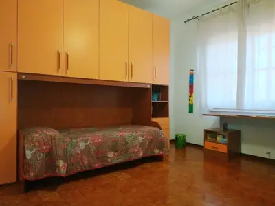 Letto o letti in una camera di Casa Angelina