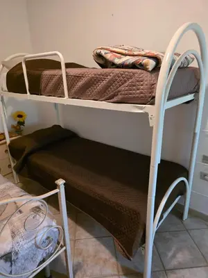 Letto o letti in una camera di Lucia's House