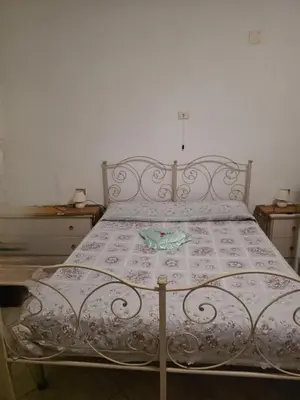 Letto o letti in una camera di Lucia's House