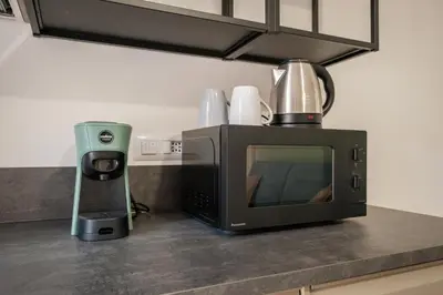 Set per la preparazione di tè e caffè presso Loft San Remy, City Center Old Town Cagliari