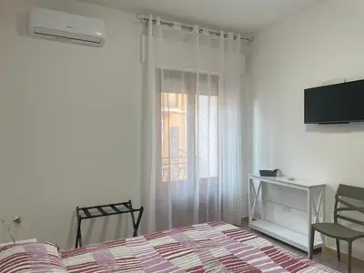 TV o dispositivi per l'intrattenimento presso Affitta camere - Casa vacanze Domu e Mari