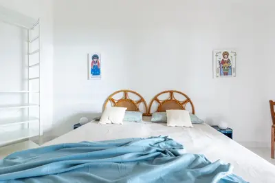 Letto o letti in una camera di Domus Sole