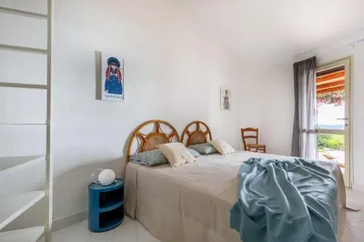 Letto o letti in una camera di Domus Sole