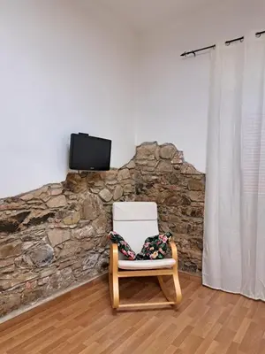 TV o dispositivi per l'intrattenimento presso Greta Guest House