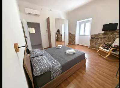 Letto o letti in una camera di Greta Guest House