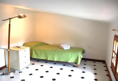 Letto o letti in una camera di Il Nido del Falco