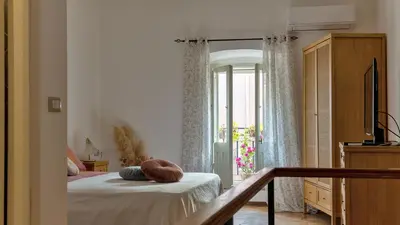 Letto o letti in una camera di By GrandMa Holiday House