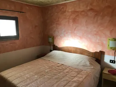 Letto o letti in una camera di Casa vacanza