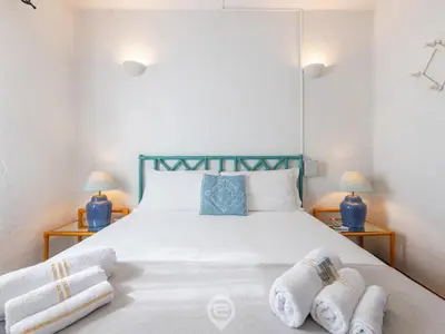 Letto o letti in una camera di Casa Belvedere