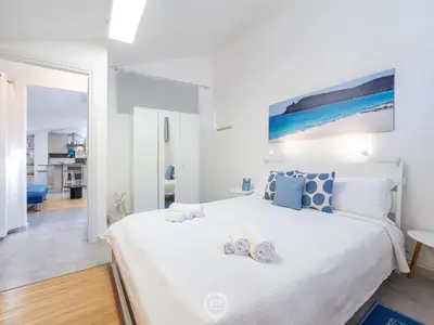 Letto o letti in una camera di Saturnino - Apartment