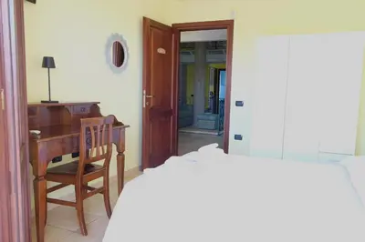 Letto o letti in una camera di B&B Sa Sinniesa