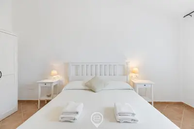 Letto o letti in una camera di Garden Delight House